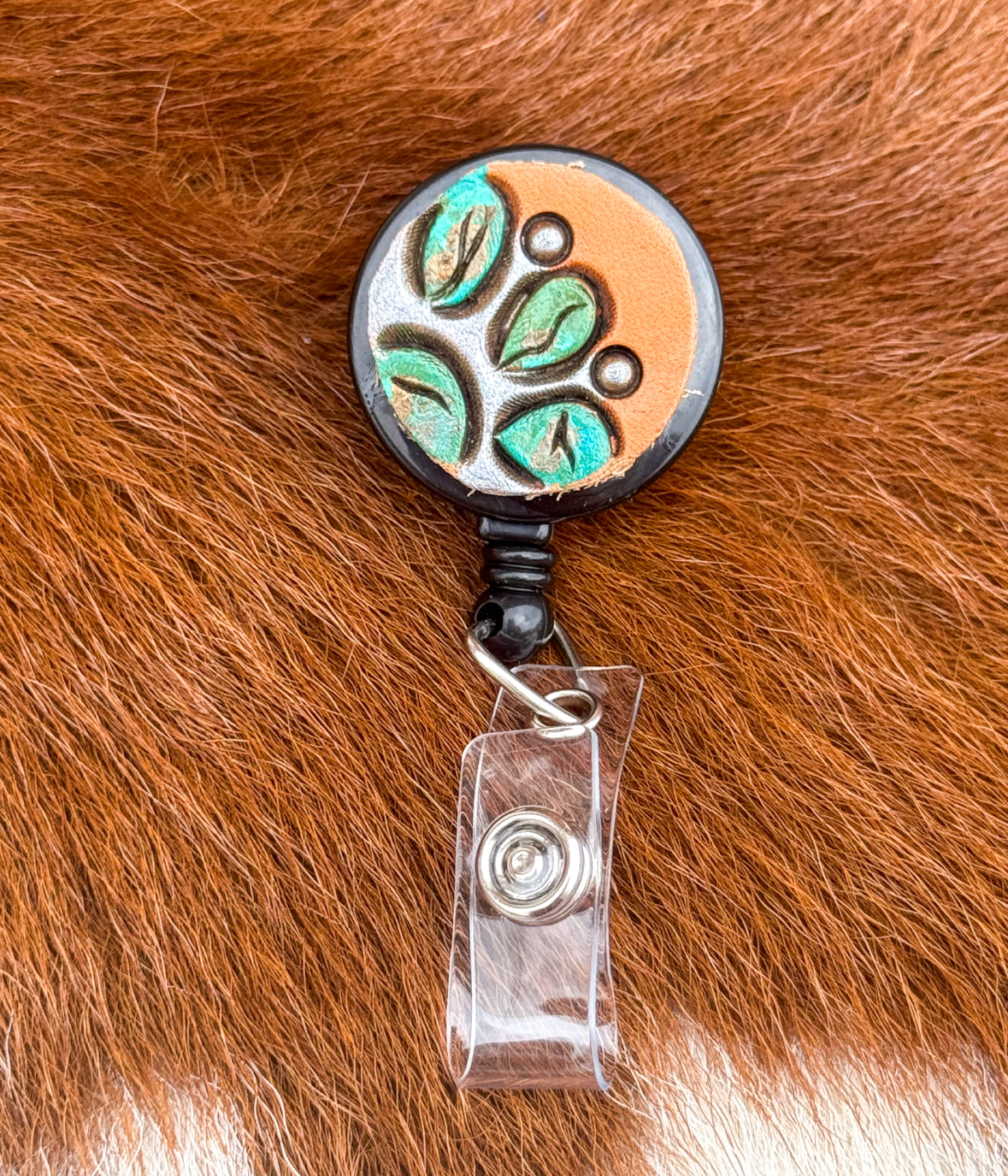 Turquoise cluster badge reel