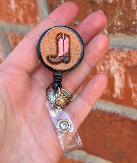 Tiny boot badge reel
