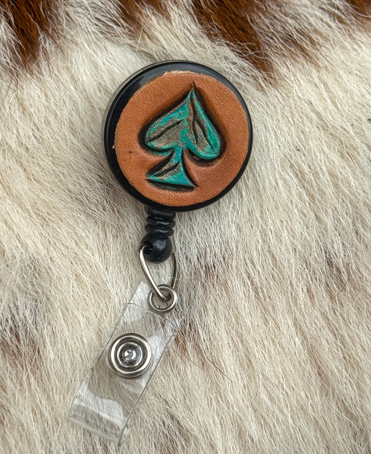 Turquoise spade badge reel