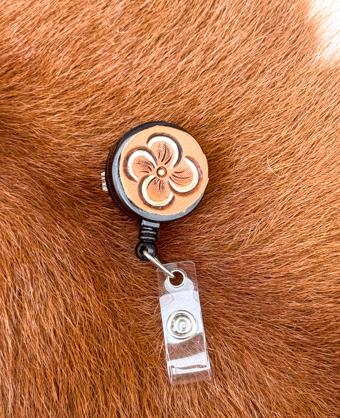 White Bloom badge reel