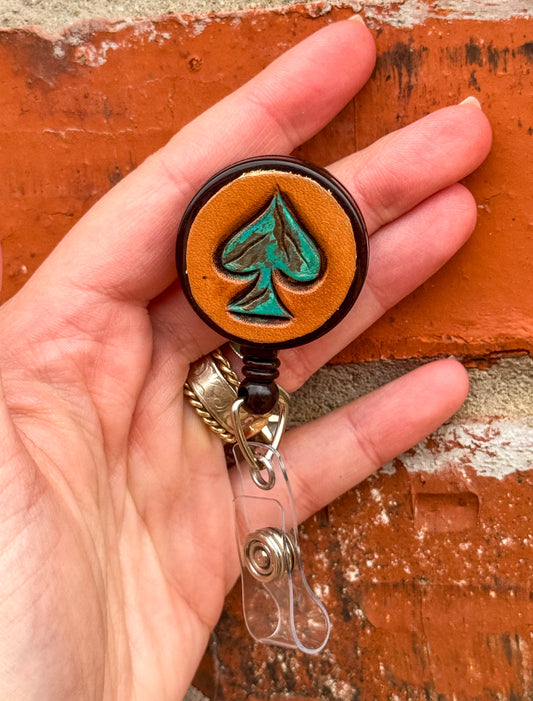 Turquoise spade badge reel